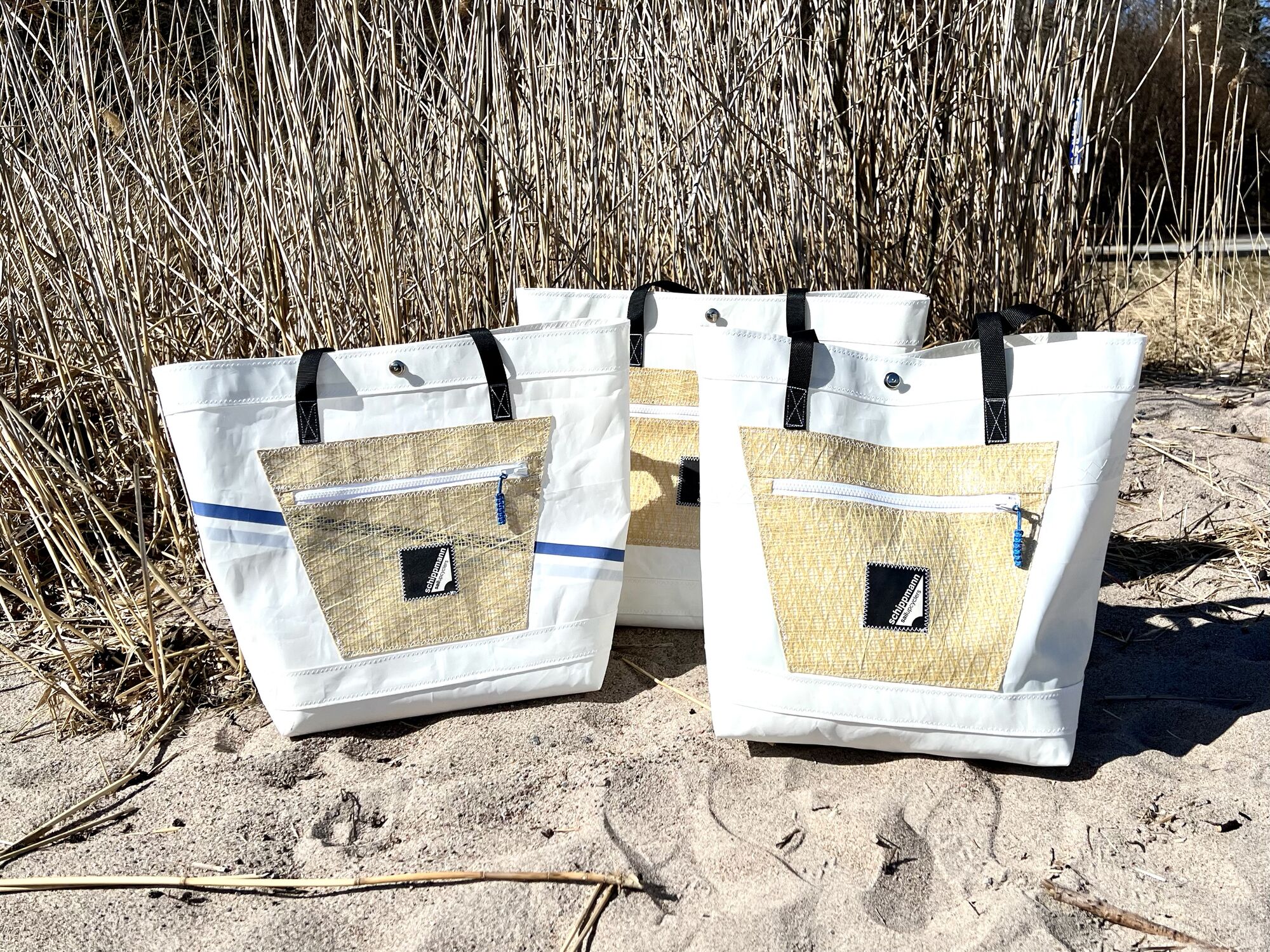 Handmade Sailupcyclers bags on the beach